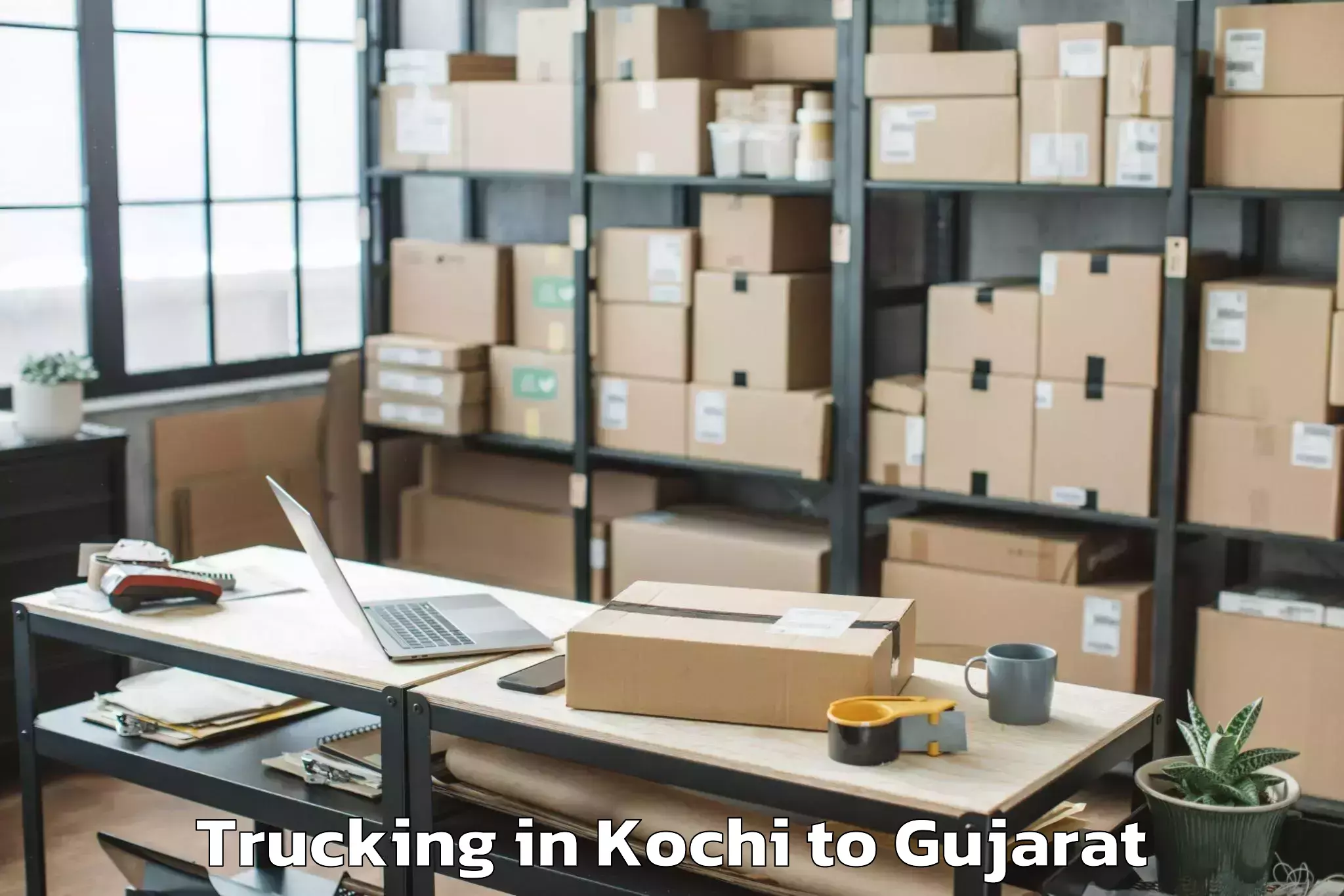 Book Kochi to Jhagadia Trucking Online